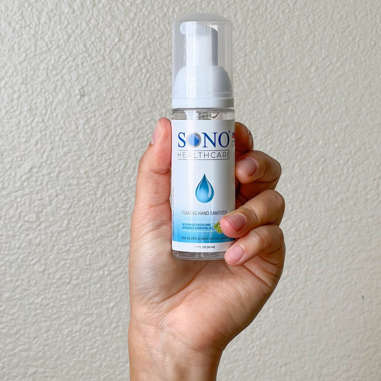 SONO Foaming Hand Sanitizer Being Held