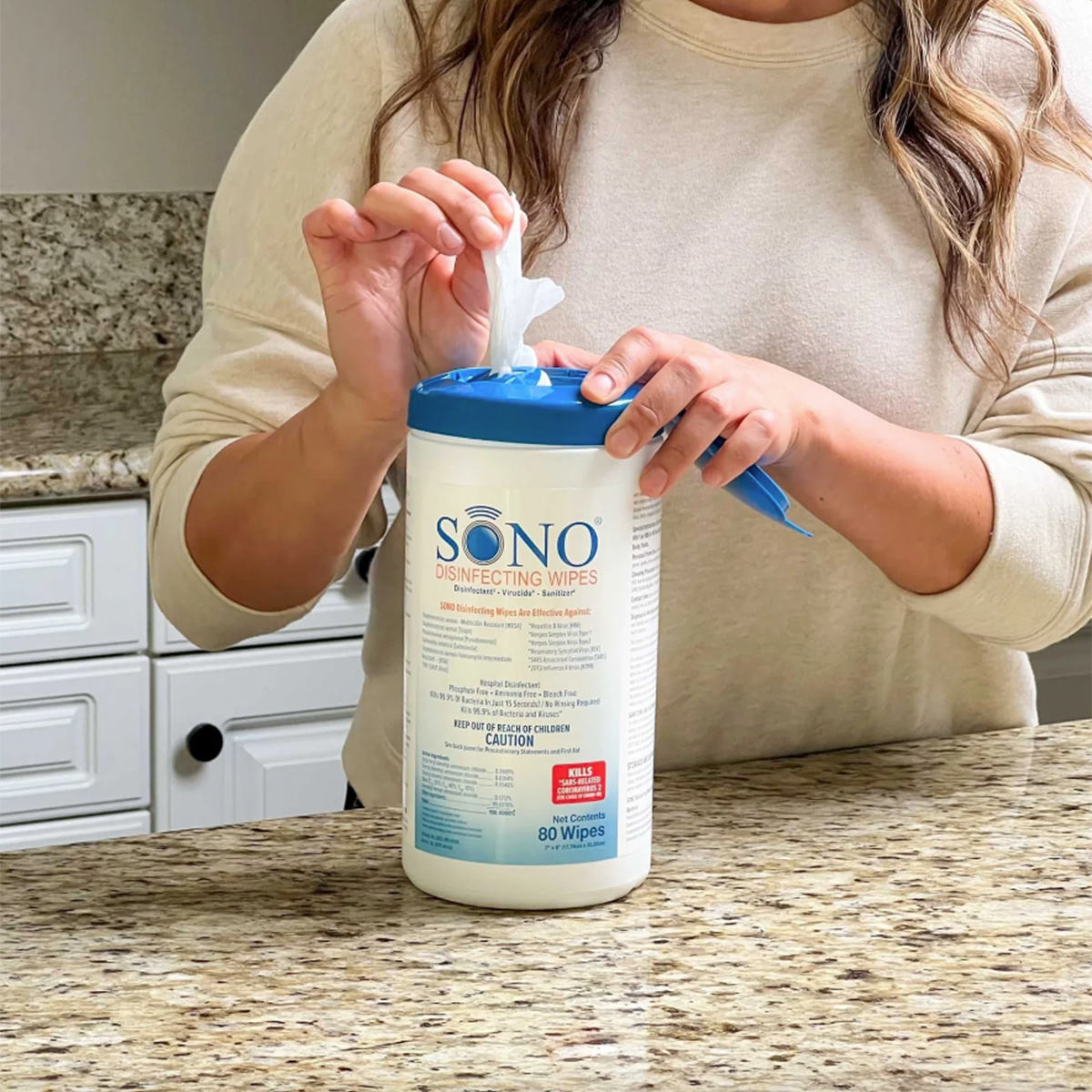 Easy-to-pull SONO Alcohol-Free Disinfecting Wipes being used on a kitchen counter, showcasing convenience and everyday use.