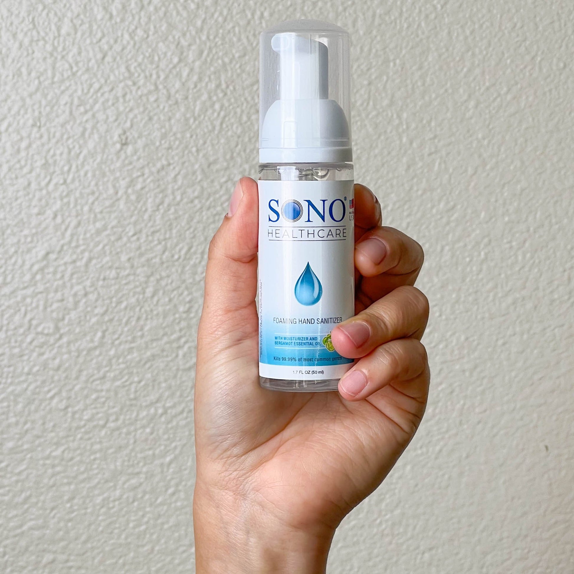 SONO Foaming Hand Sanitizer Being Held 