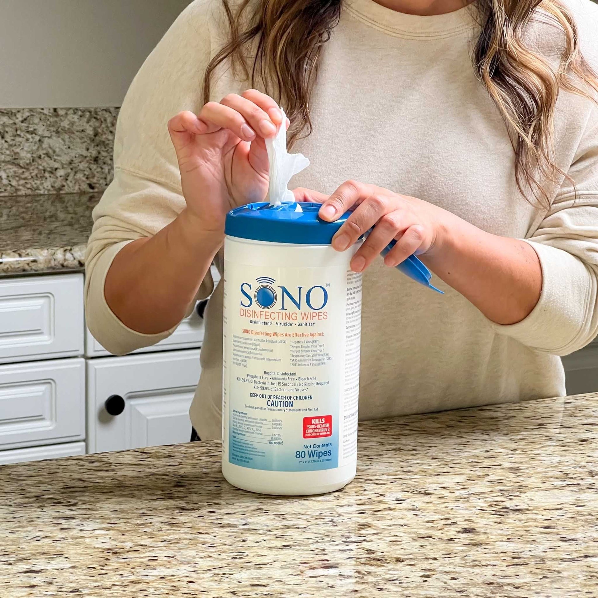 Easy-to-pull SONO Alcohol-Free Disinfecting Wipes being used on a kitchen counter, showcasing convenience and everyday use.
